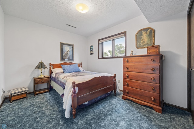 611 4th St NE, Dilworth, MN 56529 - bedroom featuring a textured ceiling and carpet floors