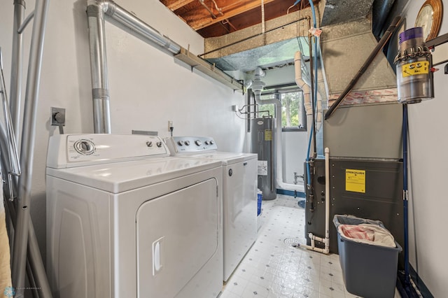 611 4th St NE, Dilworth, MN 56529 - laundry area featuring independent washer and dryer, water heater, light floors, and heating unit