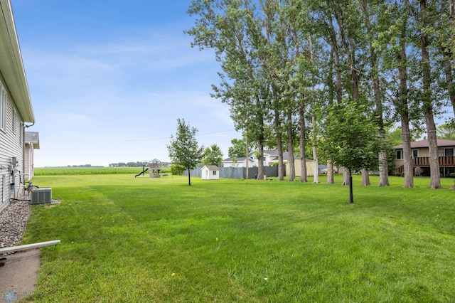 611 4th St NE, Dilworth, MN 56529 - view of green lawn with a playground