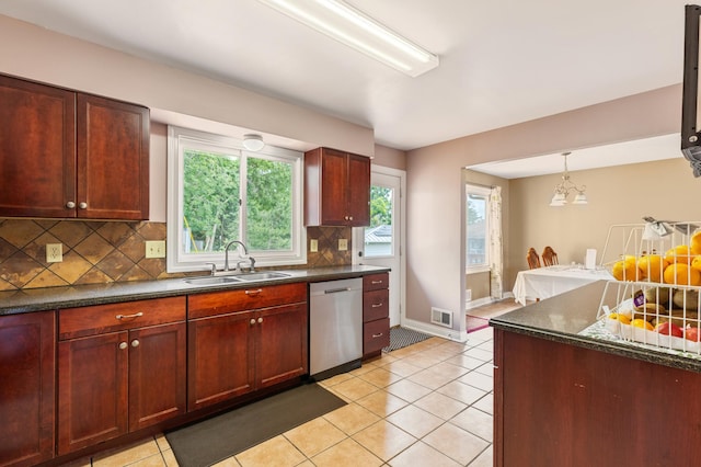 2735 Chisholm Ave N, Saint Paul, MN 55109 - kitchen with dishwasher, backsplash, plenty of natural light, and light tile patterned floors