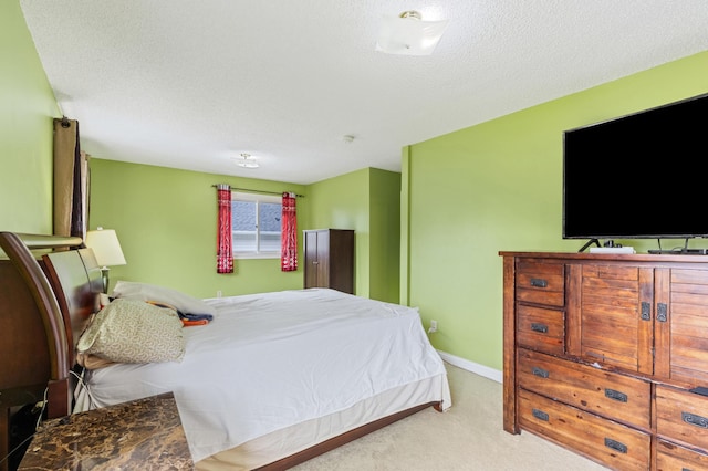 2735 Chisholm Ave N, Saint Paul, MN 55109 - carpeted bedroom with a textured ceiling and baseboards