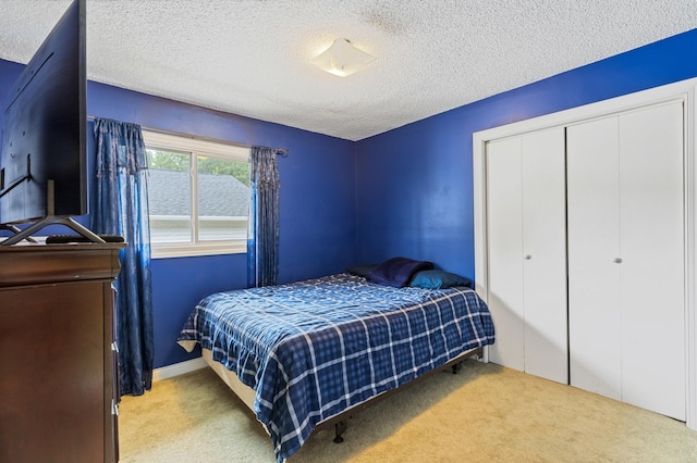 2735 Chisholm Ave N, Saint Paul, MN 55109 - carpeted bedroom with a textured ceiling and a closet