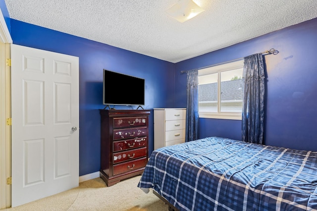 2735 Chisholm Ave N, Saint Paul, MN 55109 - carpeted bedroom with a textured ceiling