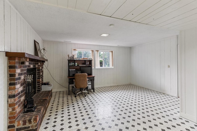 2735 Chisholm Ave N, Saint Paul, MN 55109 - office with a brick fireplace, wooden walls, and tile patterned floors