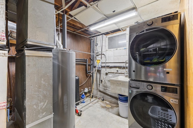 2735 Chisholm Ave N, Saint Paul, MN 55109 - laundry area featuring stacked washer and clothes dryer and water heater