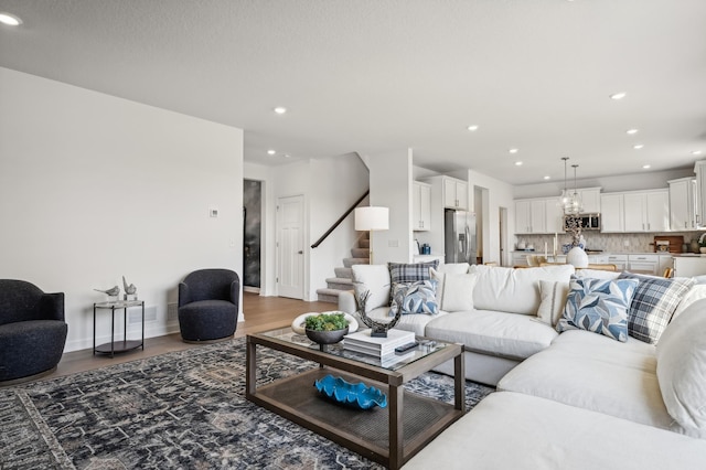 15197 Nutria St NW, Ramsey, MN 55303 - living room with recessed lighting, stairs, and wood finished floors