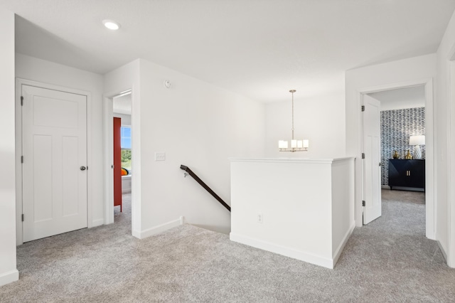 15197 Nutria St NW, Ramsey, MN 55303 - carpeted empty room featuring a chandelier and recessed lighting