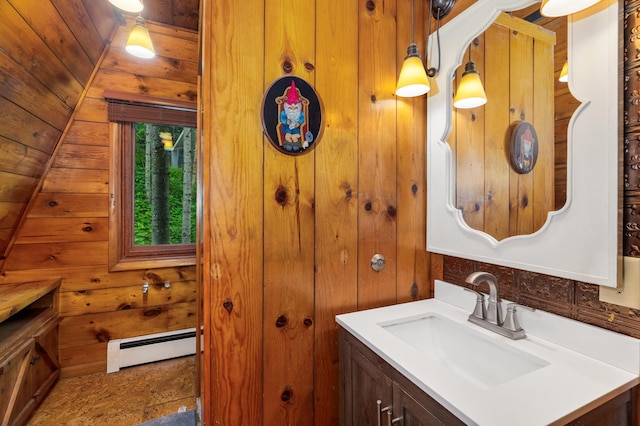 6618 Sumac Dr, Grand Lake Twp, MN 55803 - bathroom featuring baseboard heating, vanity, and wooden walls