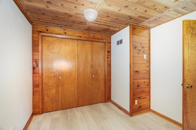 6618 Sumac Dr, Grand Lake Twp, MN 55803 - unfurnished bedroom featuring wooden ceiling, light wood-style floors, and a closet
