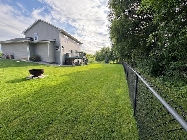12372 73rd Ct NE, Otsego, MN 55330 - view of yard featuring a wooden deck and stairs