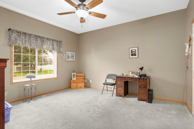 9775 Olive St NW, Coon Rapids, MN 55433 - carpeted home office with baseboards and a ceiling fan