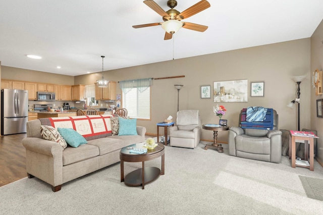 9775 Olive St NW, Coon Rapids, MN 55433 - carpeted living room with ceiling fan and recessed lighting