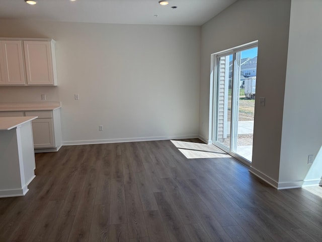1719 Hauer Trl, Shakopee, MN 55379 - unfurnished dining area with dark wood-type flooring and recessed lighting