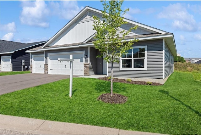 4838 Education Dr N, Hugo, MN 55038 - view of front of property featuring asphalt driveway, an attached garage, and a front yard