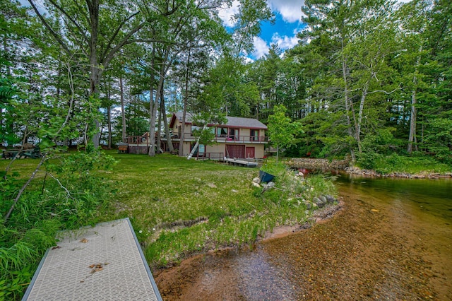 10399 Sandy Beach Rd, Round Lake Twp, WI 54843 - view of yard featuring a deck