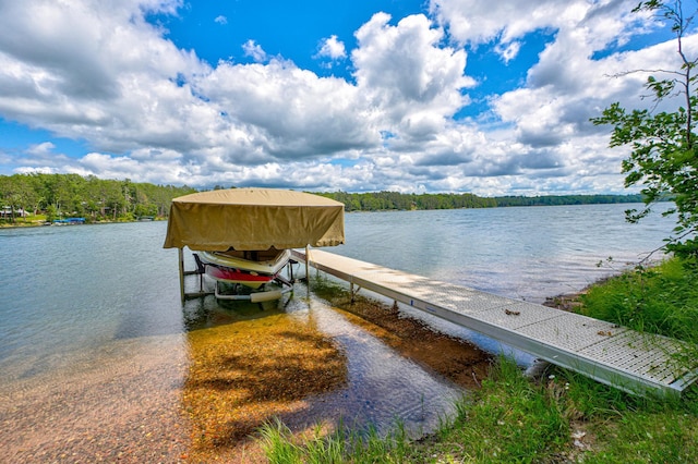 10399 Sandy Beach Rd, Round Lake Twp, WI 54843 - dock area with boat lift and a water view