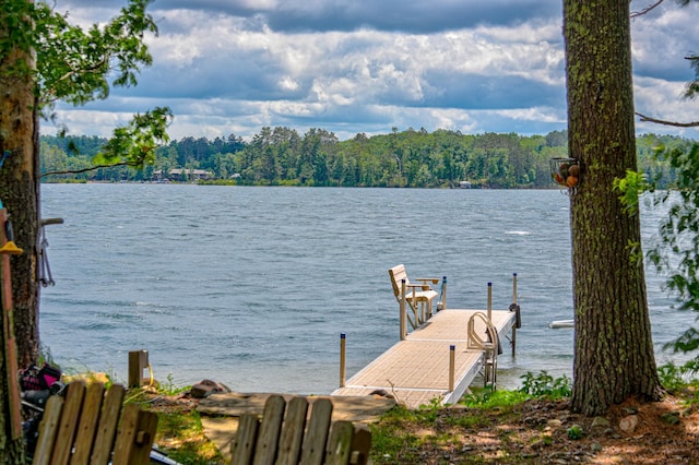 10399 Sandy Beach Rd, Round Lake Twp, WI 54843 - dock area with a water view and a wooded view