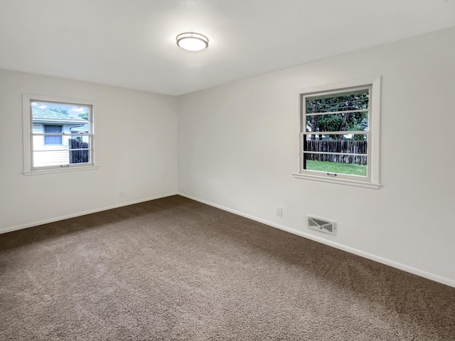5808 Colfax Ave N, Brooklyn Center, MN 55430 - unfurnished room with carpet floors and baseboards