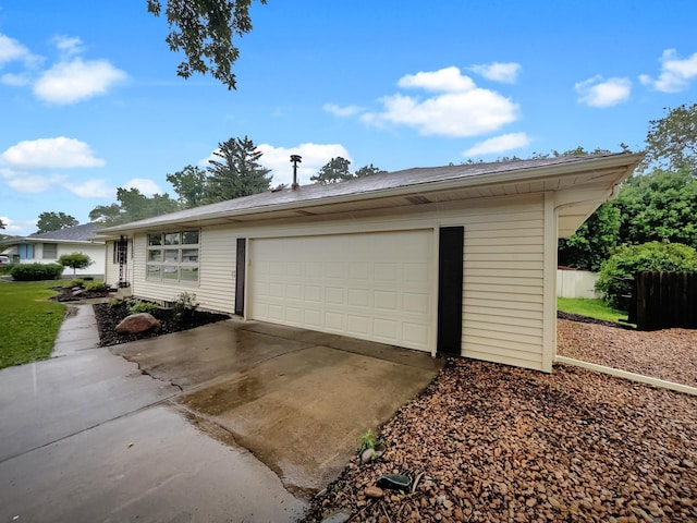 5808 Colfax Ave N, Brooklyn Center, MN 55430 - view of front of house with driveway and a garage