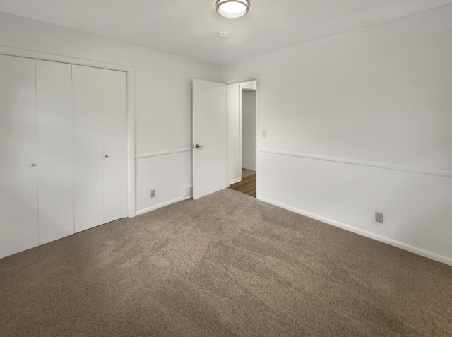 5808 Colfax Ave N, Brooklyn Center, MN 55430 - unfurnished bedroom featuring carpet flooring and a closet