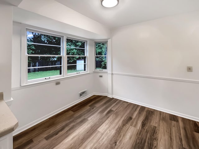 5808 Colfax Ave N, Brooklyn Center, MN 55430 - empty room with dark wood-style flooring
