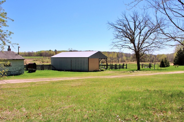 7210 79th Ave SW, Staples, MN 56479 - view of yard featuring a pole building, an outdoor structure, and a view of countryside