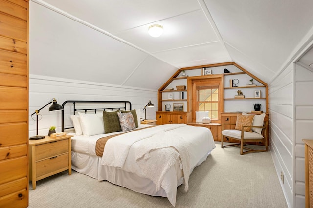 4604 39th St, Saint Louis Park, MN 55416 - bedroom featuring light carpet, vaulted ceiling, and wood walls