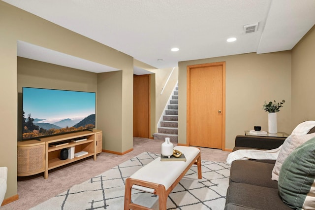 4604 39th St, Saint Louis Park, MN 55416 - living area featuring light colored carpet, stairs, and recessed lighting