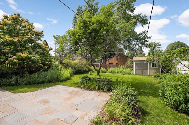 4604 39th St, Saint Louis Park, MN 55416 - view of yard with a patio area and a storage unit
