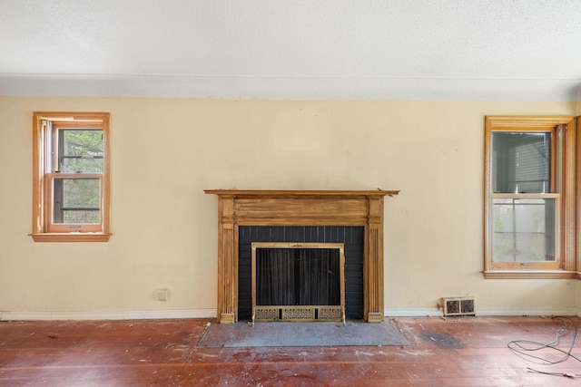 5123 Chicago Ave, Minneapolis, MN 55417 - detailed view of wood finished floors and a fireplace with flush hearth