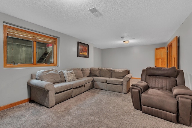1302 Grizzly Ln, Sartell, MN 56377 - carpeted living room featuring a textured ceiling and baseboards