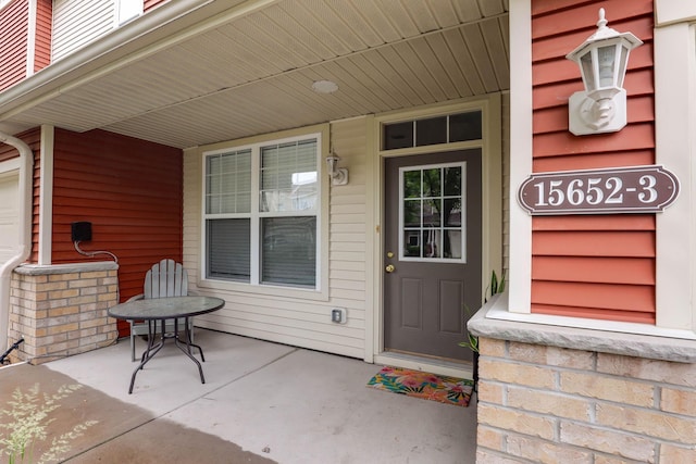 15652 Emerald Dr N Unit 3, Hugo, MN 55038 - doorway to property with covered porch