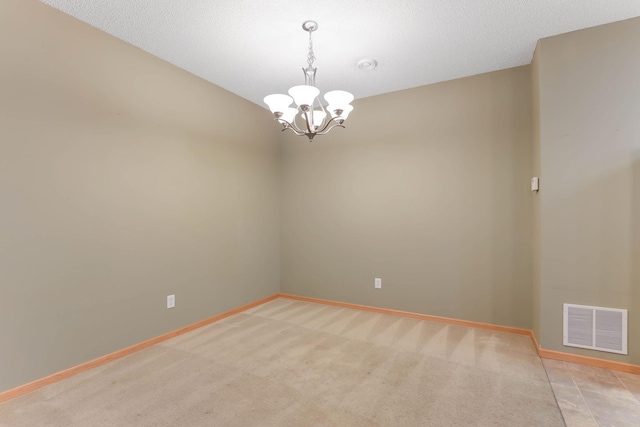 15652 Emerald Dr N Unit 3, Hugo, MN 55038 - empty room with a chandelier and light colored carpet