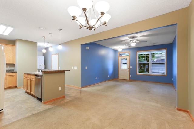 15652 Emerald Dr N Unit 3, Hugo, MN 55038 - kitchen with dishwasher, light colored carpet, light brown cabinets, a chandelier, and an island with sink