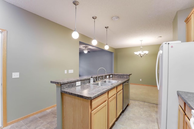 15652 Emerald Dr N Unit 3, Hugo, MN 55038 - kitchen with freestanding refrigerator, stainless steel dishwasher, dark countertops, a ceiling fan, and a textured ceiling