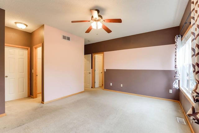 15652 Emerald Dr N Unit 3, Hugo, MN 55038 - empty room with ceiling fan and carpet floors