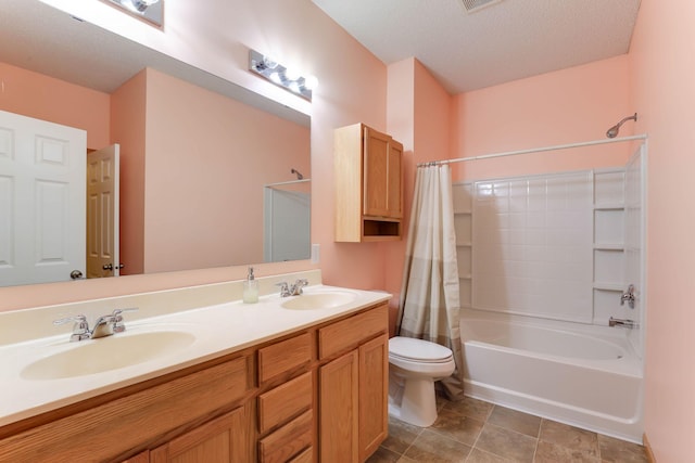 15652 Emerald Dr N Unit 3, Hugo, MN 55038 - bathroom with shower / bath combination with curtain, double vanity, and a textured ceiling