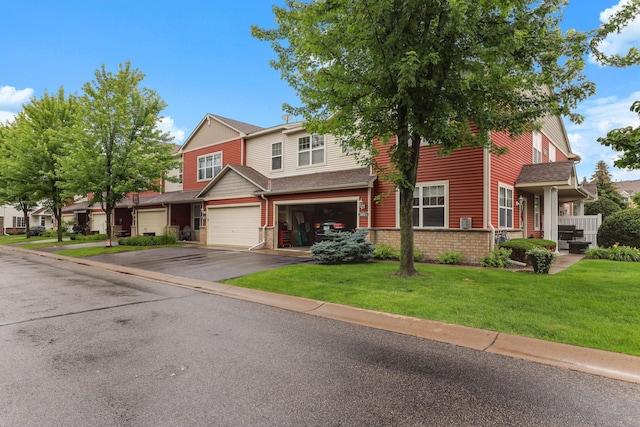 15652 Emerald Dr N Unit 3, Hugo, MN 55038 - view of property featuring a garage, driveway, a front lawn, brick siding, and roof with shingles