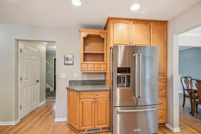 8924 Darnel Rd, Eden Prairie, MN 55347 - kitchen with high end fridge, light wood-style floors, and recessed lighting