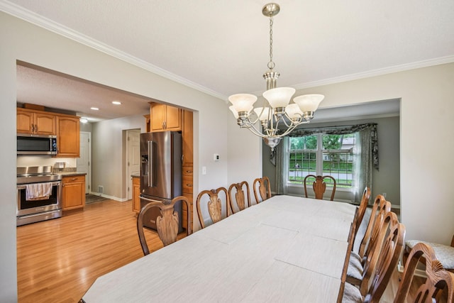 8924 Darnel Rd, Eden Prairie, MN 55347 - dining area with ornamental molding, light wood-type flooring, and a chandelier