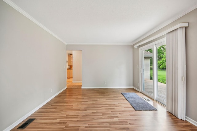 8924 Darnel Rd, Eden Prairie, MN 55347 - spare room featuring crown molding and light wood finished floors