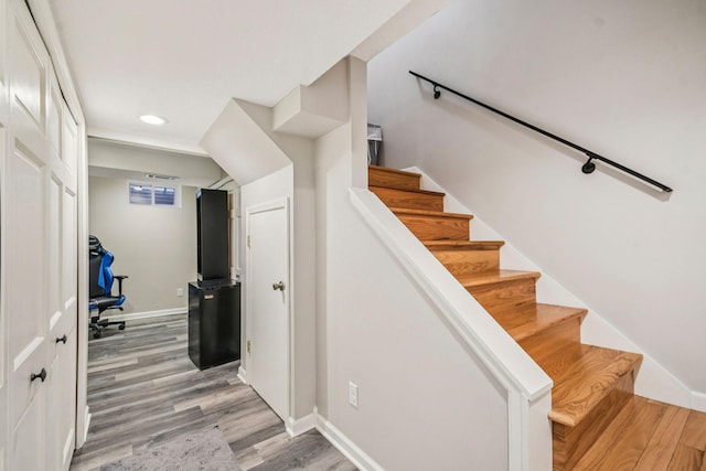 8924 Darnel Rd, Eden Prairie, MN 55347 - staircase with wood finished floors and recessed lighting