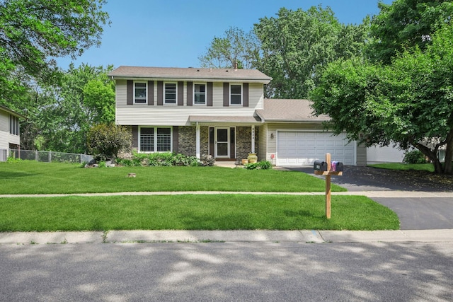 8924 Darnel Rd, Eden Prairie, MN 55347 - view of front of house featuring asphalt driveway and a garage