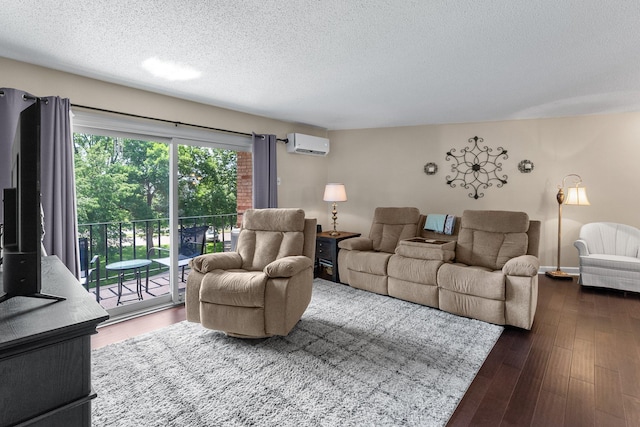 1150 Dellwood St S Unit 306, Cambridge, MN 55008 - living room with a wall mounted AC, a textured ceiling, and wood finished floors