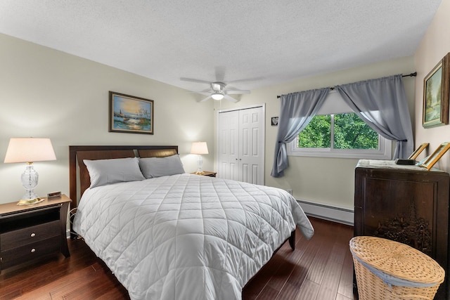 1150 Dellwood St S Unit 306, Cambridge, MN 55008 - bedroom with a baseboard heating unit, a closet, wood-type flooring, a textured ceiling, and ceiling fan