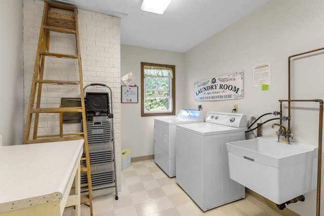 1150 Dellwood St S Unit 306, Cambridge, MN 55008 - laundry room featuring light floors and washing machine and clothes dryer
