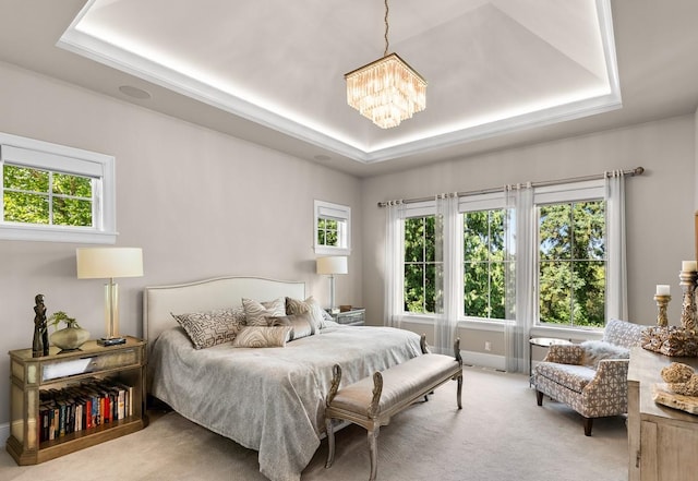 1595 Locust Hills Cir, Wayzata, MN 55391 - carpeted bedroom with a tray ceiling and a chandelier