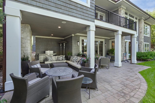 1595 Locust Hills Cir, Wayzata, MN 55391 - patio / terrace with outdoor lounge area, an outdoor kitchen, and a patio area