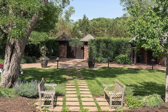 1595 Locust Hills Cir, Wayzata, MN 55391 - view of grassy yard featuring a gate