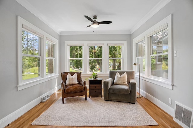 1511 Branston St, Saint Paul, MN 55108 - sunroom / solarium with wood finished floors and crown molding